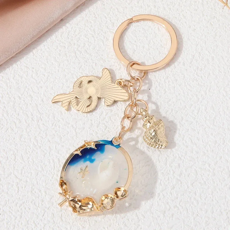 JC - Ocean Life Keychain: Whale and shell design, ideal for women and men, handmade gift