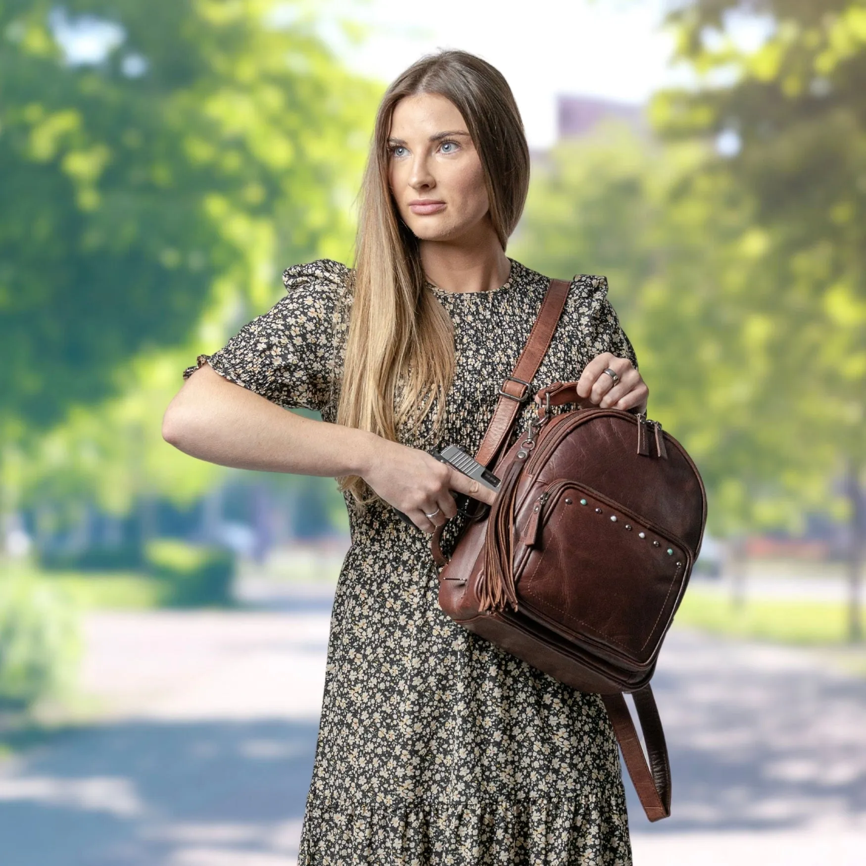 Sawyer | Concealed Carry Leather Backpack | Full Grain Leather with Stud Accents | Locking Exterior Concealment Pocket | RFID Organizer